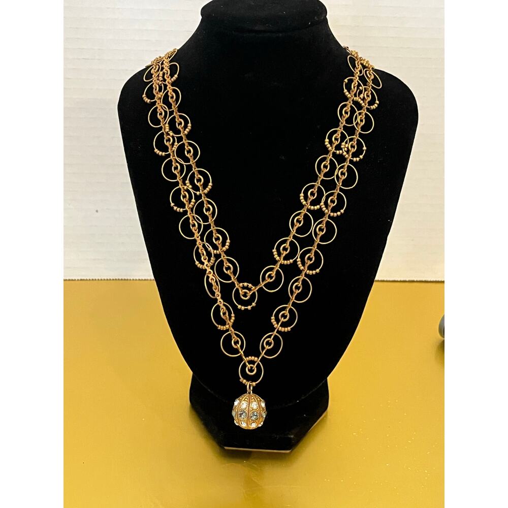 Catherine Popesco layered gold plated necklace with crystal ball charm